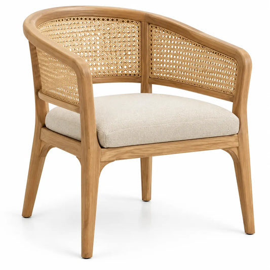 Chaise beige à accoudoirs courbés, dossier ajouré et coussin clair
