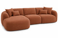 Canapé d'angle terre cuite aux formes arrondies et coussins assortis